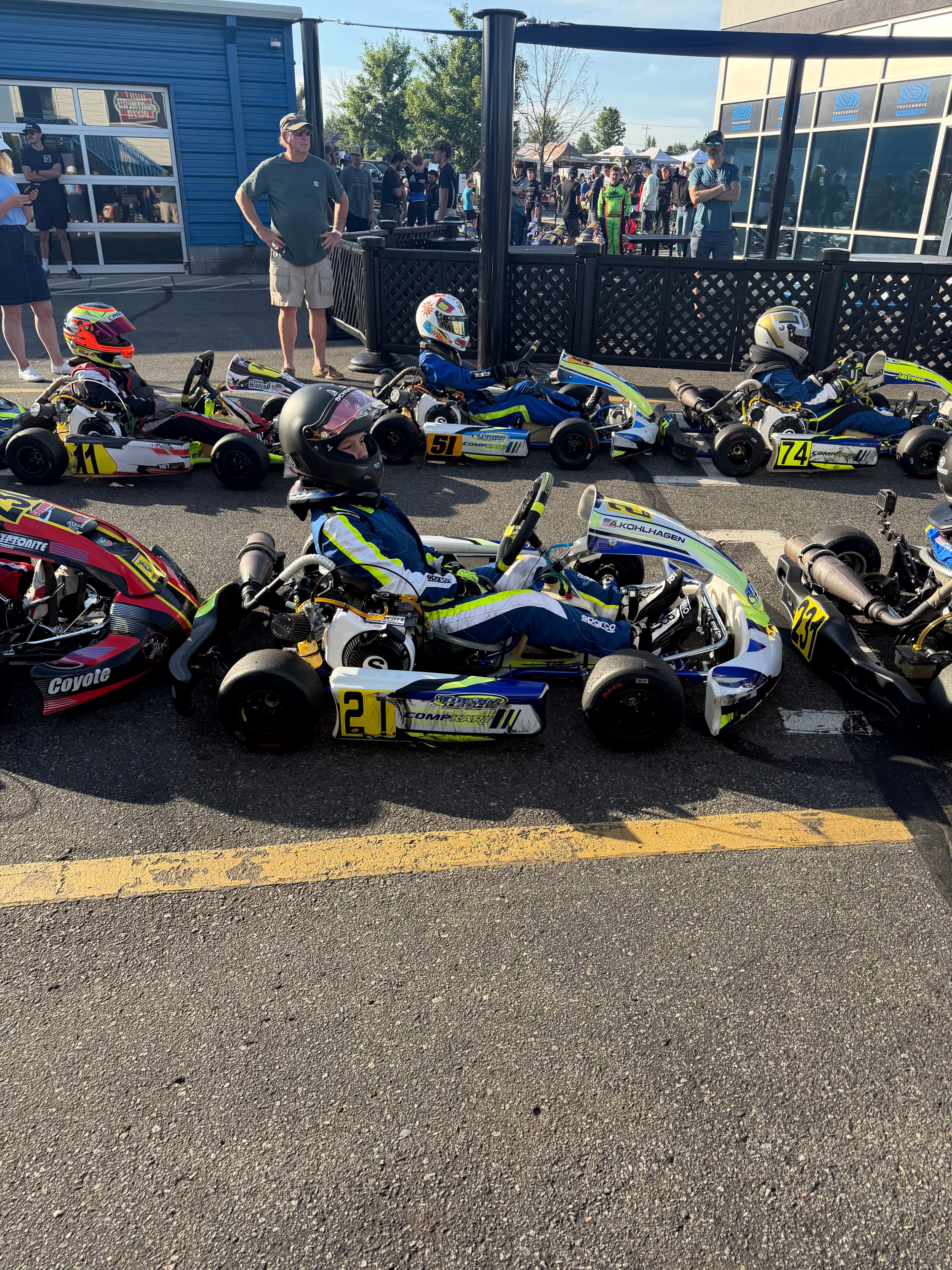 Karts lined up in the paddock — Kohlhagen kart ready